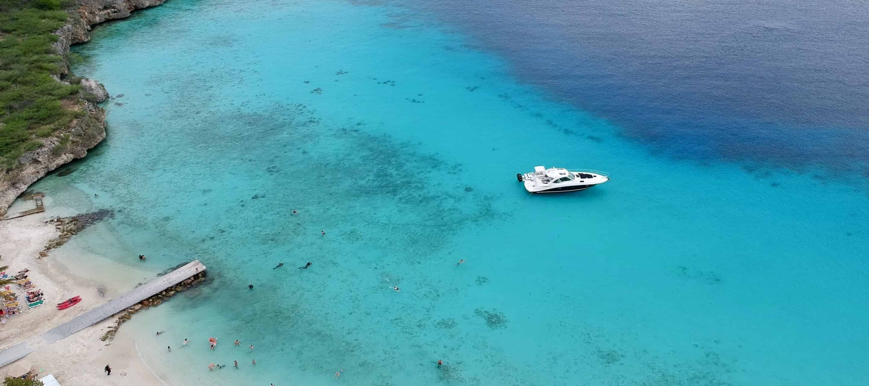 Boat, beach and blue sea